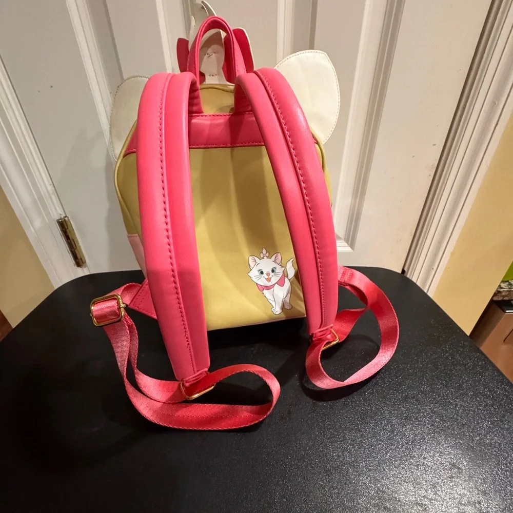 Disney loungefly Japan Tokyo  Pink and White Marie aristocrat Cupcake backpack